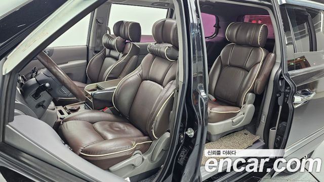 Kia Canival 2011 — photo 10