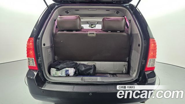 Kia Canival 2011 — photo 20