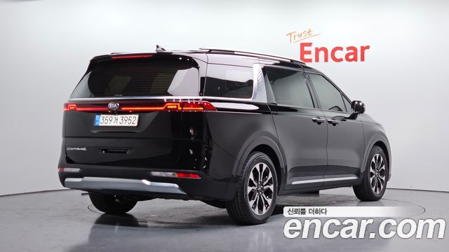 Kia Canival 2021 — photo 2