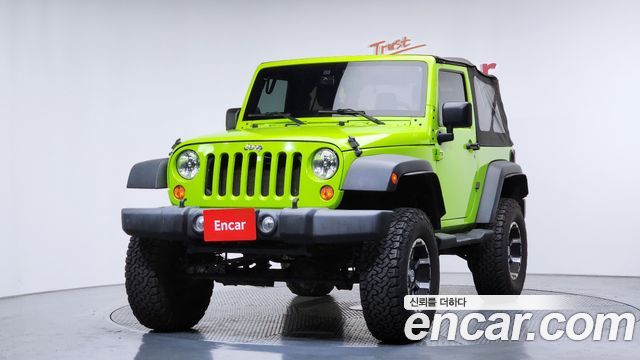 Jeep Wrangler 2013 — photo 1