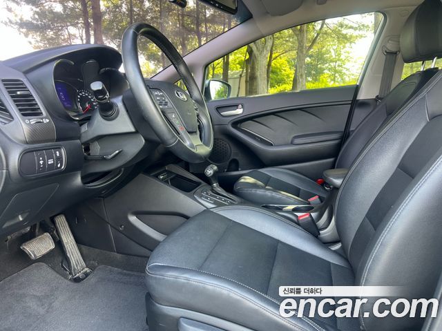 Kia K3 2014 — photo 8