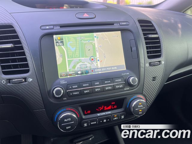 Kia K3 2014 — photo 14