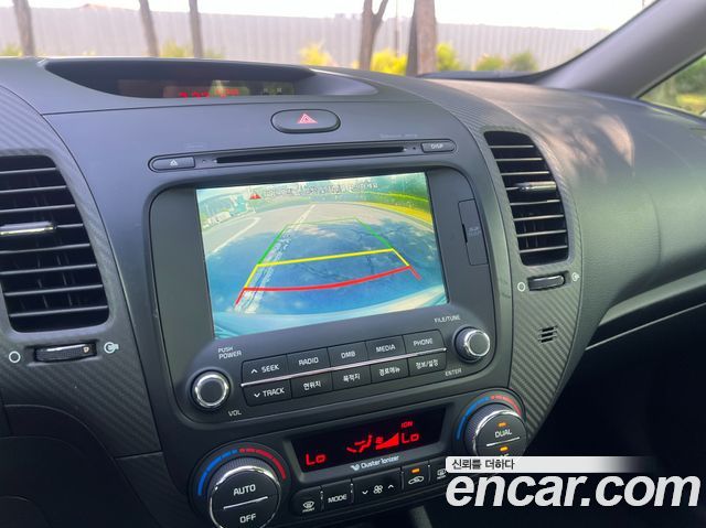 Kia K3 2014 — photo 15