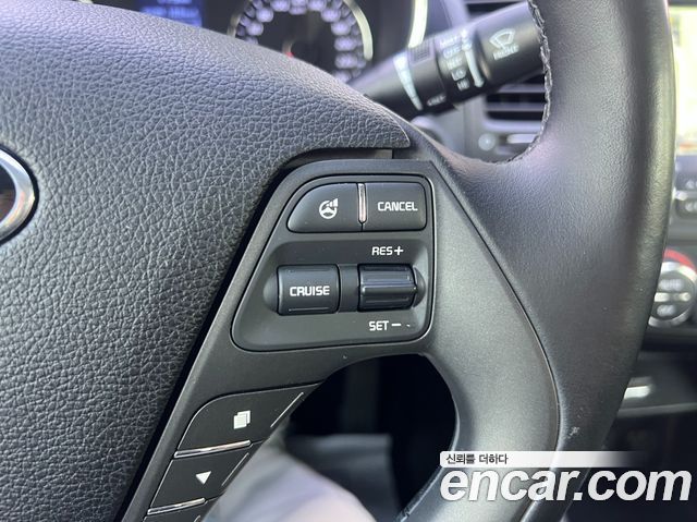 Kia K3 2014 — photo 16