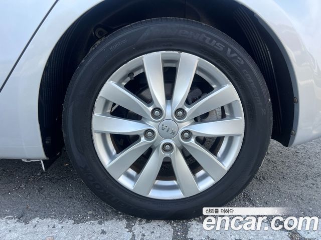 Kia K3 2014 — photo 17