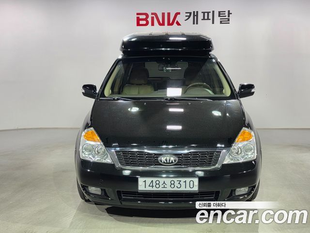 Kia Canival 2013 — photo 2