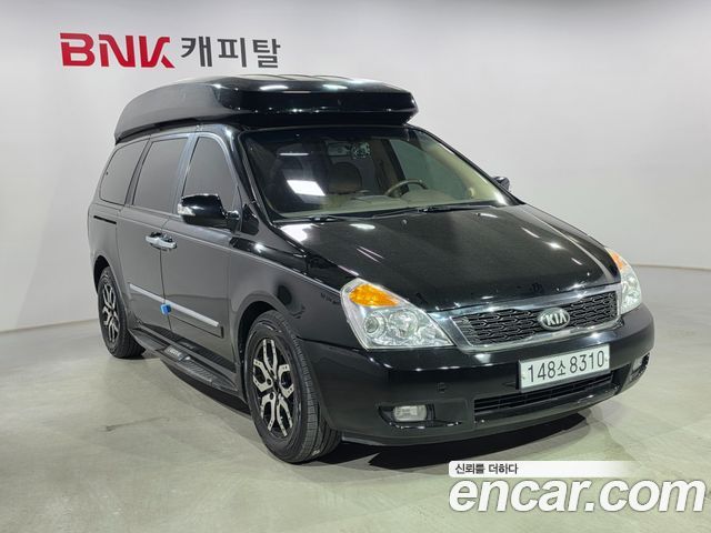 Kia Canival 2013 — photo 3