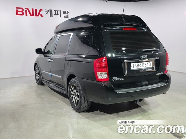 Kia Canival 2013 — photo 4