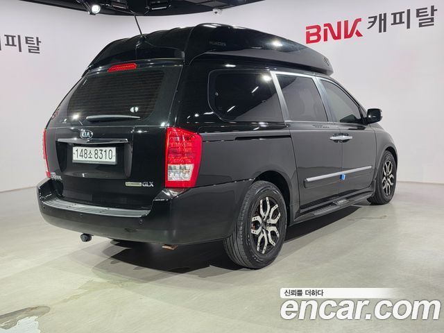 Kia Canival 2013 — photo 6