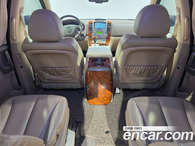 Kia Canival 2013 — photo 12