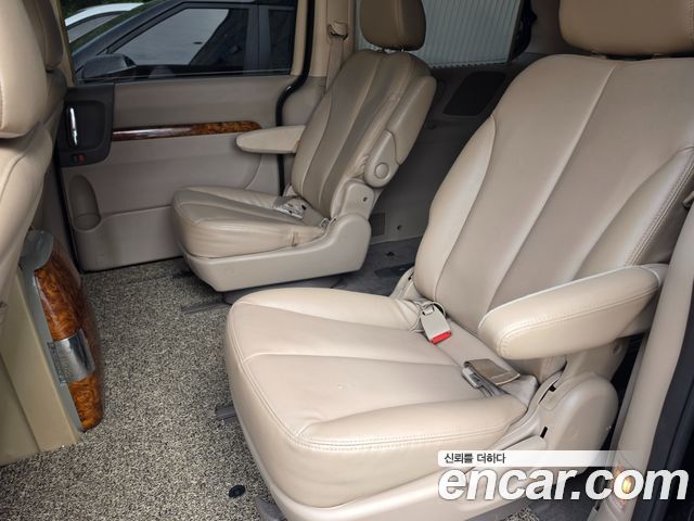 Kia Canival 2013 — photo 13