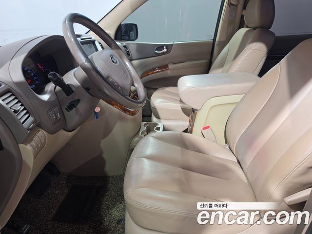 Kia Canival 2013 — photo 14