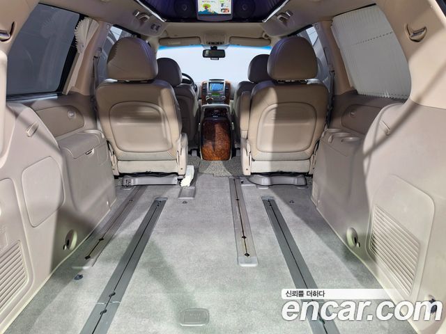 Kia Canival 2013 — photo 17
