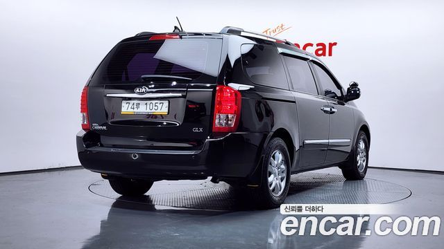 Kia Canival 2013 — photo 2