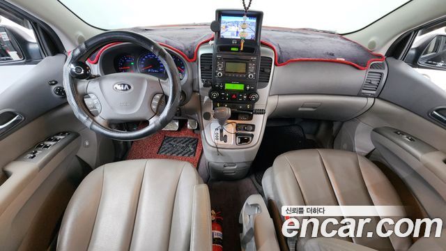 Kia Canival 2013 — photo 10