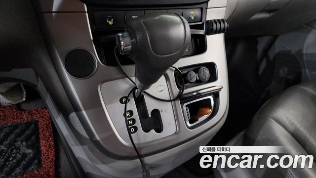 Kia Canival 2013 — photo 12