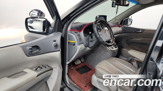 Kia Canival 2013 — photo 13