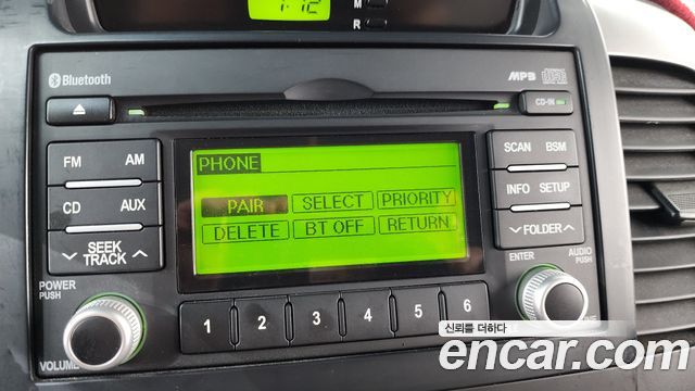 Kia Canival 2013 — photo 18