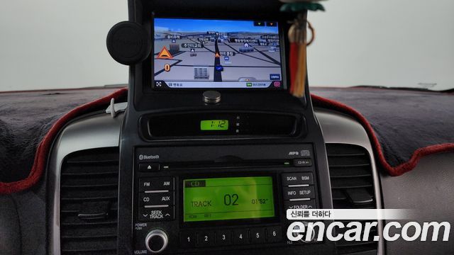 Kia Canival 2013 — photo 20