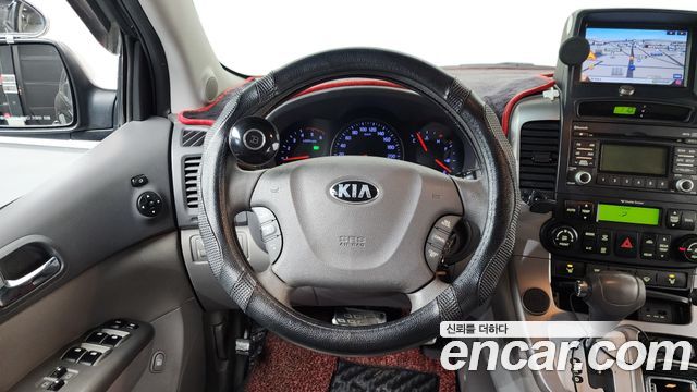 Kia Canival 2013 — photo 21