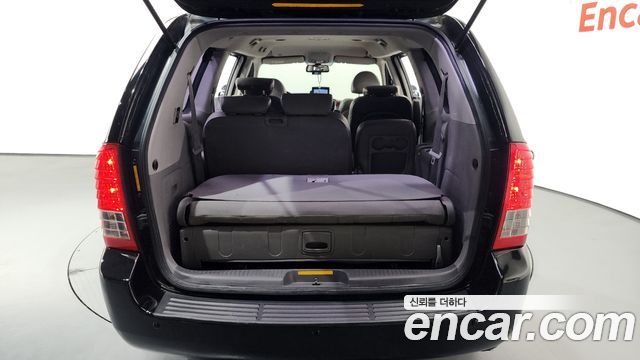 Kia Canival 2013 — photo 24
