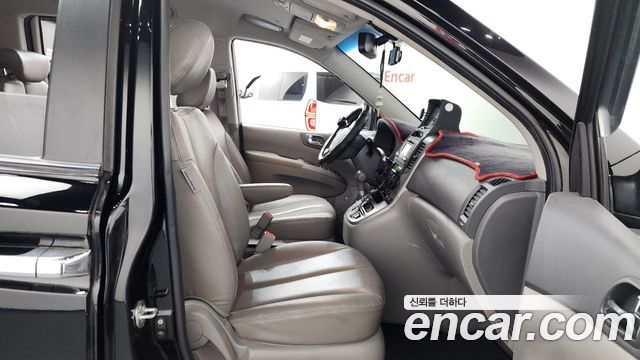 Kia Canival 2013 — photo 16