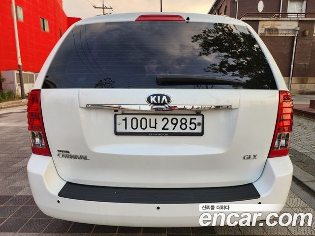 Kia Canival 2013 — photo 2