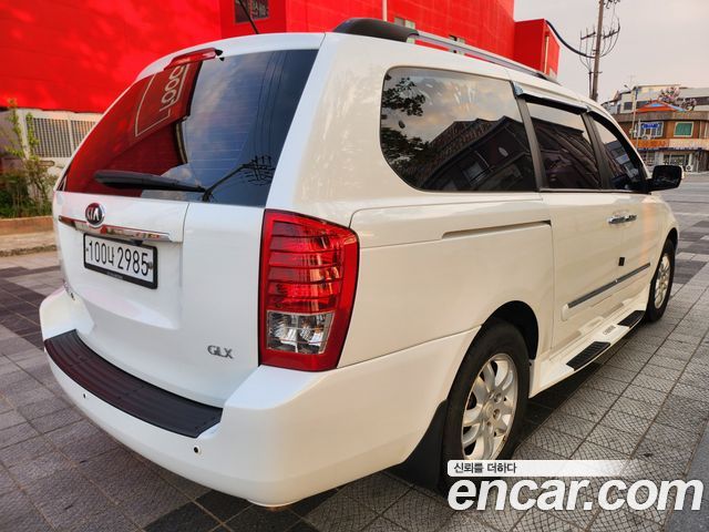 Kia Canival 2013 — photo 4