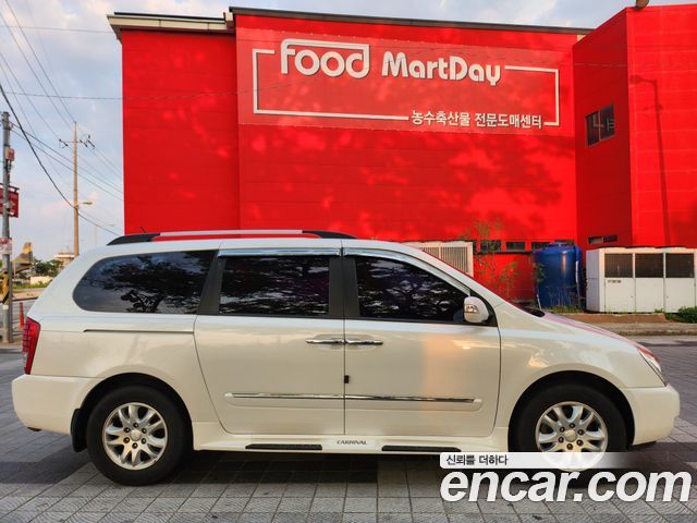 Kia Canival 2013 — photo 8