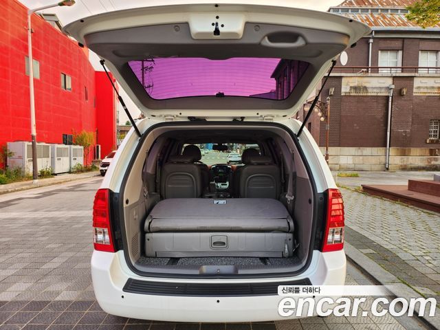 Kia Canival 2013 — photo 10