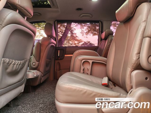 Kia Canival 2013 — photo 12