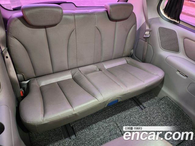 Kia Canival 2013 — photo 13