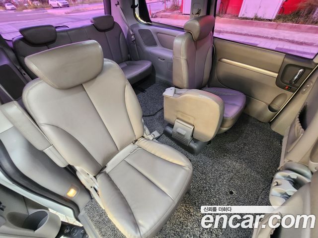 Kia Canival 2013 — photo 14