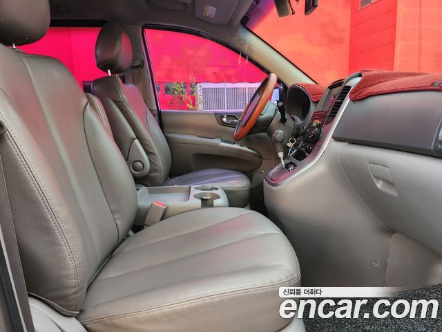 Kia Canival 2013 — photo 15