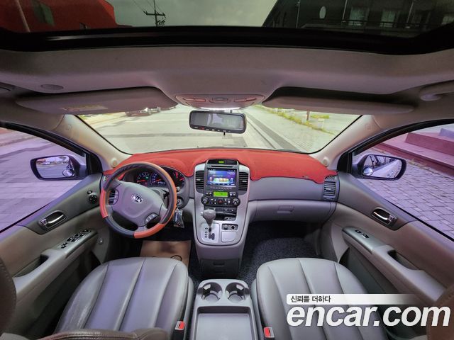 Kia Canival 2013 — photo 16