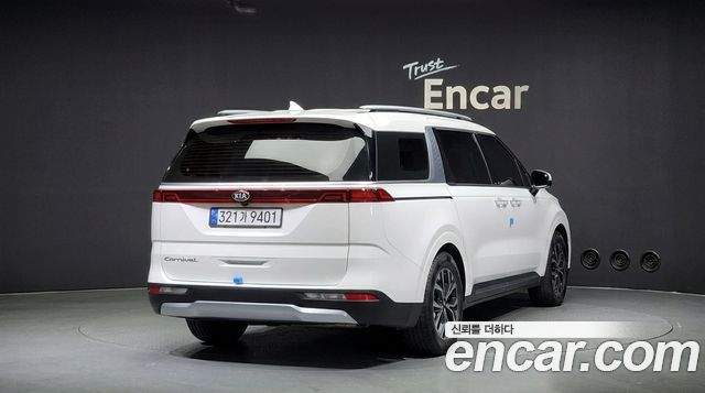 Kia Canival 2021 — photo 2