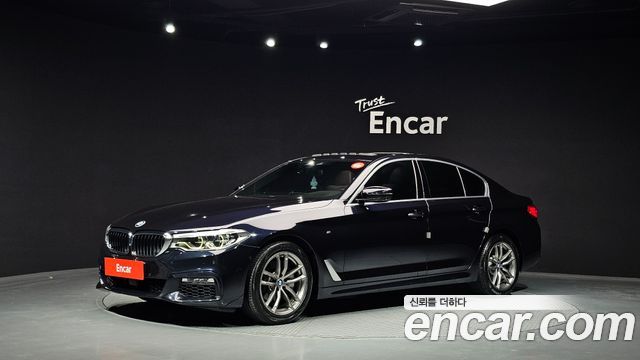 BMW 5-Series 2018 — photo 1