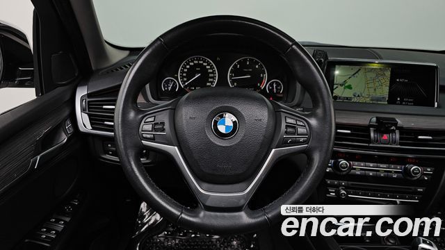 BMW X5 2014 — photo 19