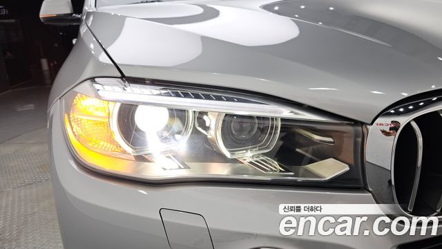 BMW X5 2014 — photo 8