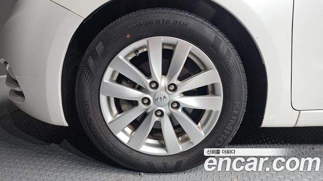 Kia K3 2014 — photo 5