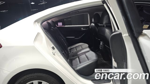 Kia K3 2014 — photo 11