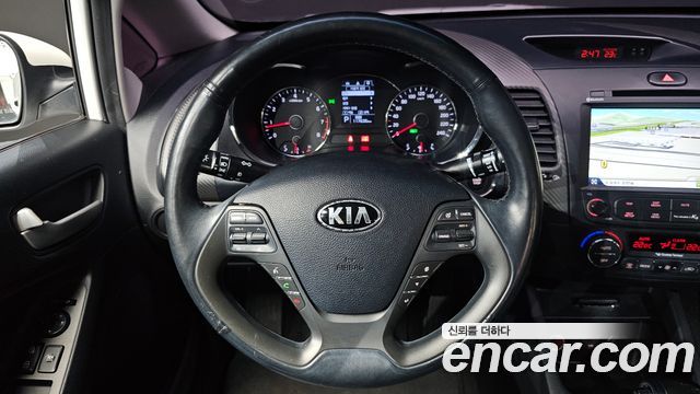 Kia K3 2014 — photo 16