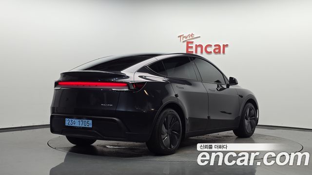 Tesla Model Y 2025 — photo 2