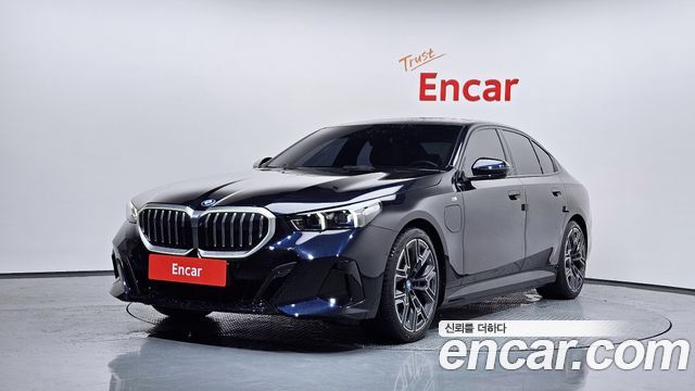 BMW 5-Series 2025 — photo 1