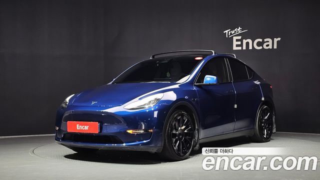 Tesla Model Y 2021 — photo 1
