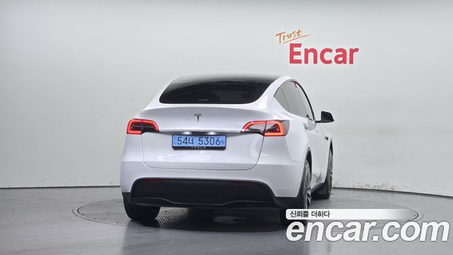 Tesla Model Y 2024 — photo 4