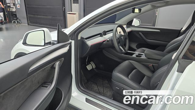 Tesla Model Y 2024 — photo 10