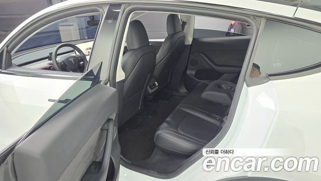 Tesla Model Y 2024 — photo 11