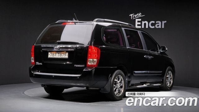 Kia Canival 2013 — photo 2