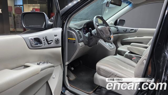 Kia Canival 2013 — photo 10